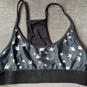 Chic Black Sports Bra with White Bird Design